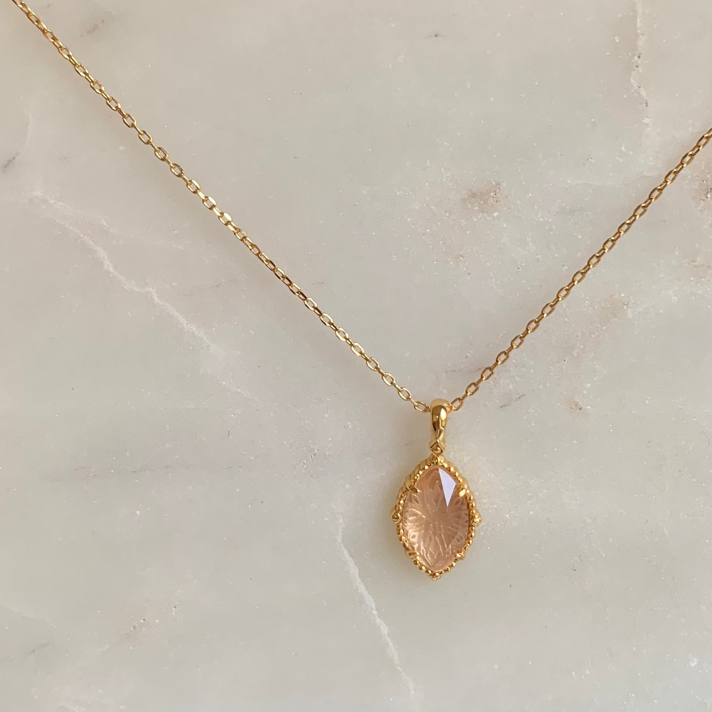 The Charlotte Rose Quartz Necklace comes with a marquise cut rose quartz pendant on a gold chain. You can't take your eye off its exquisite design.  Rose quartz is known as the "Love Stone". It encourages all kinds of love including self love, romantic love or even friendship. It also promotes confidence and compassion for others.